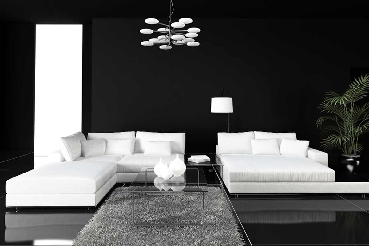 salotto con parete nera e lampadario stiloso