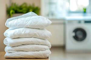 Trapunte sintetiche: come lavarle al meglio tra cicli, temperature e dosi giuste