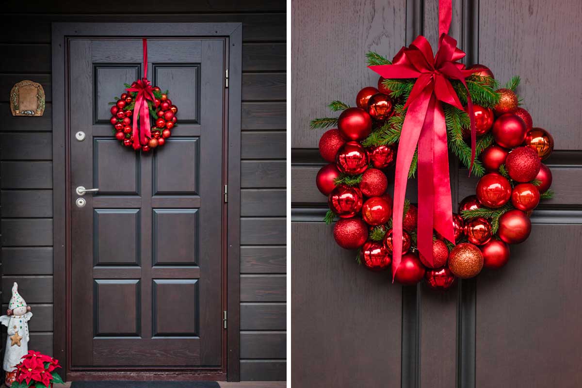 Ghirlanda con palline rosse lucide e fiocco coordinato per decorare la porta
