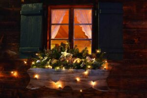 Finestre di Natale: come decorare il lato esterno e creare un bagliore che incanta chi passa