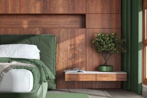 Camera da letto con Verde Kaki e parete attrezzata in legno.